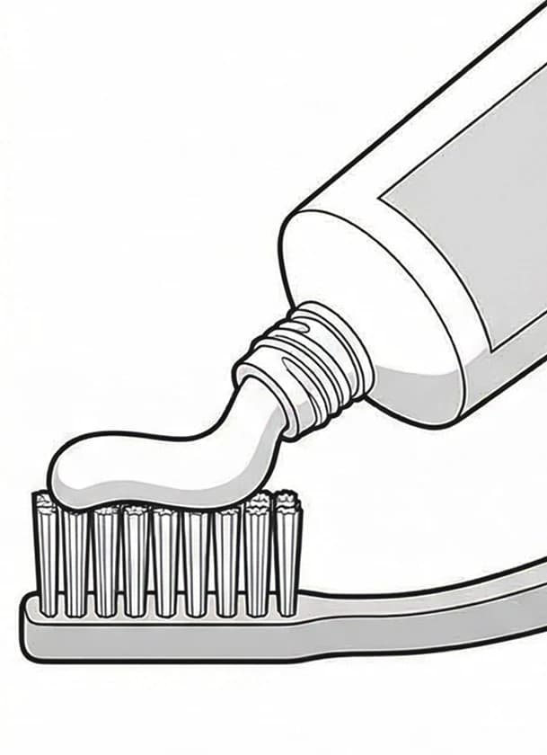 Toothpaste squeezed in a thin layer onto the bristles of a toothbrush
